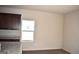 Kitchen with granite countertop and brown cabinets at 552 Moline Way, Locust Grove, GA 30248