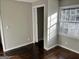 Simple bedroom with dark hardwood floors and a closet at 4844 Fairforest Dr, Stone Mountain, GA 30088