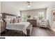 Spacious bedroom with hardwood floors and large windows at 5158 Noble Village Way # 35, Lilburn, GA 30047