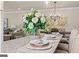 Kitchen island with seating and a decorative centerpiece at 5158 Noble Village Way # 35, Lilburn, GA 30047