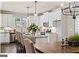 Bright and spacious kitchen with an island and hardwood floors at 5158 Noble Village Way # 35, Lilburn, GA 30047