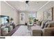 Bright and airy living room with comfortable seating and large window at 5158 Noble Village Way # 35, Lilburn, GA 30047