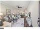 Spacious living room featuring hardwood floors and ample natural light at 5158 Noble Village Way # 35, Lilburn, GA 30047