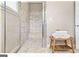 Spacious shower with stone tile and glass enclosure at 5158 Noble Village Way # 35, Lilburn, GA 30047