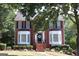 Two-story brick home with bay windows at 9342 Carillon Ct, Jonesboro, GA 30236