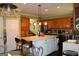 Modern kitchen with an island, ample storage, and a large pantry at 9342 Carillon Ct, Jonesboro, GA 30236