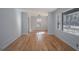 Hardwood floors and neutral-toned walls in the living room at 1684 Lake Harbin Rd, Morrow, GA 30260