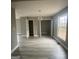 Bright dining room with gray walls and wood-look flooring at 1438 Rome Nw Dr, Atlanta, GA 30314