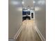 Modern kitchen boasts blue cabinets, stainless steel appliances, and hardwood floors at 1838 Moore Nw St, Atlanta, GA 30318