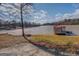 Relaxing lakeside deck with seating area and lake access at 885 Malcom Rd, Covington, GA 30014