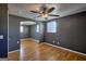 Spacious bedroom with hardwood floors and ceiling fan at 6358 Hemp St, Douglasville, GA 30135