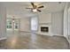 Spacious living room with hardwood floors and fireplace at 312 Summer Pl, Peachtree City, GA 30269