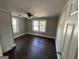 Bright bedroom with hardwood floors and multiple windows at 361 Almon Rd, Covington, GA 30014