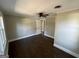 Spacious bedroom with hardwood floors and neutral walls at 361 Almon Rd, Covington, GA 30014
