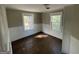 Charming bedroom with hardwood floors and wainscoting at 361 Almon Rd, Covington, GA 30014