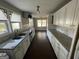 Kitchen with white cabinets, granite countertops, and stainless steel appliances at 361 Almon Rd, Covington, GA 30014