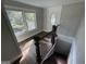 Upper level landing with hardwood floors and staircase at 361 Almon Rd, Covington, GA 30014