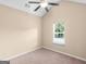 Bedroom with window, ceiling fan and carpet at 118 Worthy Dr, Mcdonough, GA 30252