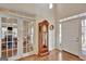 Grand entryway with hardwood floors, tall ceilings and French doors at 100 Dresden Pl, Fayetteville, GA 30215