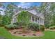 Two story house with wrap around porch and landscaped yard at 100 Dresden Pl, Fayetteville, GA 30215