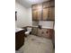 Small bathroom needing renovation with damaged flooring at 779 Dial Mill Rd, Oxford, GA 30054