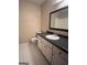 Simple bathroom with a toilet, vanity, and shower at 779 Dial Mill Rd, Oxford, GA 30054