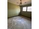 Spacious bedroom with ceiling fan and large windows at 779 Dial Mill Rd, Oxford, GA 30054