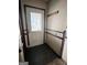 Front entry with a stained-glass door and coat rack at 779 Dial Mill Rd, Oxford, GA 30054