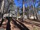 Ranch home with detached workshop nestled in a wooded lot at 779 Dial Mill Rd, Oxford, GA 30054