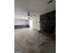 Living room with a stone fireplace and access to other rooms at 779 Dial Mill Rd, Oxford, GA 30054
