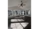 Bright sunroom featuring a vaulted ceiling, bay window, and laminate flooring at 779 Dial Mill Rd, Oxford, GA 30054