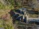 Top-down view of a house showcasing its roofline and landscaping at 100 Kindlehurst Dr, Tyrone, GA 30290