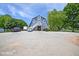 Blue barn with large doors and parking area at 460 Dixie Rd, Covington, GA 30014