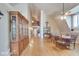 Spacious dining room with hardwood floors and large windows at 460 Dixie Rd, Covington, GA 30014