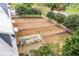 Several paddocks with white fencing and storage structures at 460 Dixie Rd, Covington, GA 30014
