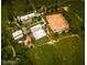 Aerial view of the property and equestrian facilities at 460 Dixie Rd, Covington, GA 30014