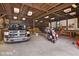 Garage with truck, motorcycle, and various items at 460 Dixie Rd, Covington, GA 30014