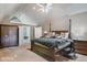 Spacious main bedroom with a large bed, ample closet space, and plenty of natural light at 460 Dixie Rd, Covington, GA 30014