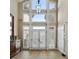 Spacious two-story entryway with tile flooring at 460 Dixie Rd, Covington, GA 30014