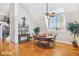 Bright dining room with hardwood floors and a ceiling fan at 460 Dixie Rd, Covington, GA 30014