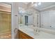 Clean bathroom with double vanity and shower at 460 Dixie Rd, Covington, GA 30014