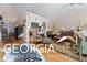 Living room with hardwood floors and eclectic decor at 460 Dixie Rd, Covington, GA 30014