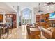 Vaulted ceilings and an open floor plan highlight this living room at 460 Dixie Rd, Covington, GA 30014