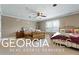 Charming bedroom with two beds and a ceiling fan at 460 Dixie Rd, Covington, GA 30014