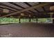 Covered outdoor riding arena with sand footing at 460 Dixie Rd, Covington, GA 30014