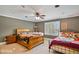 Bedroom with two beds and a ceiling fan at 460 Dixie Rd, Covington, GA 30014