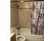 Bathroom with shower/tub and floral shower curtain at 3806 London Dr, Decatur, GA 30032