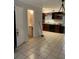 Kitchen and adjacent bathroom with tile floors at 3806 London Dr, Decatur, GA 30032
