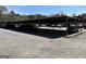 Community carport with covered parking spaces for residents at 3000 Parc Lorraine, Lithonia, GA 30038