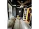 Sunroom with tiled floor, ceiling fan, and ample natural light at 3000 Parc Lorraine, Lithonia, GA 30038